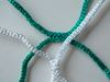 Afbeelding van  Doelnetten voor seniorendoelen clubkleuren GROEN & WIT